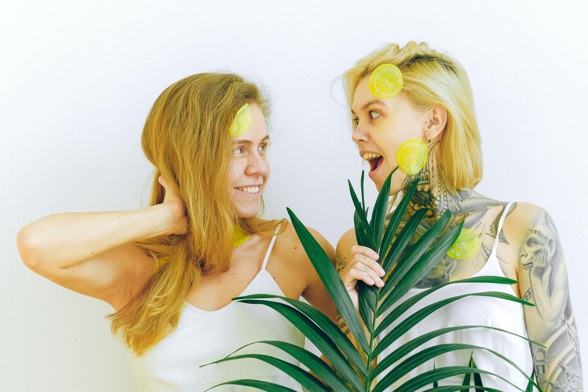 Woman holding silicone vibrators, exploring sensitivity changes